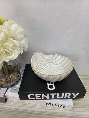 Cindy Crawford A Set of Two Off White Shell Ceramic Bowls with Tan Rim